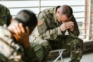 Military members sitting in a group